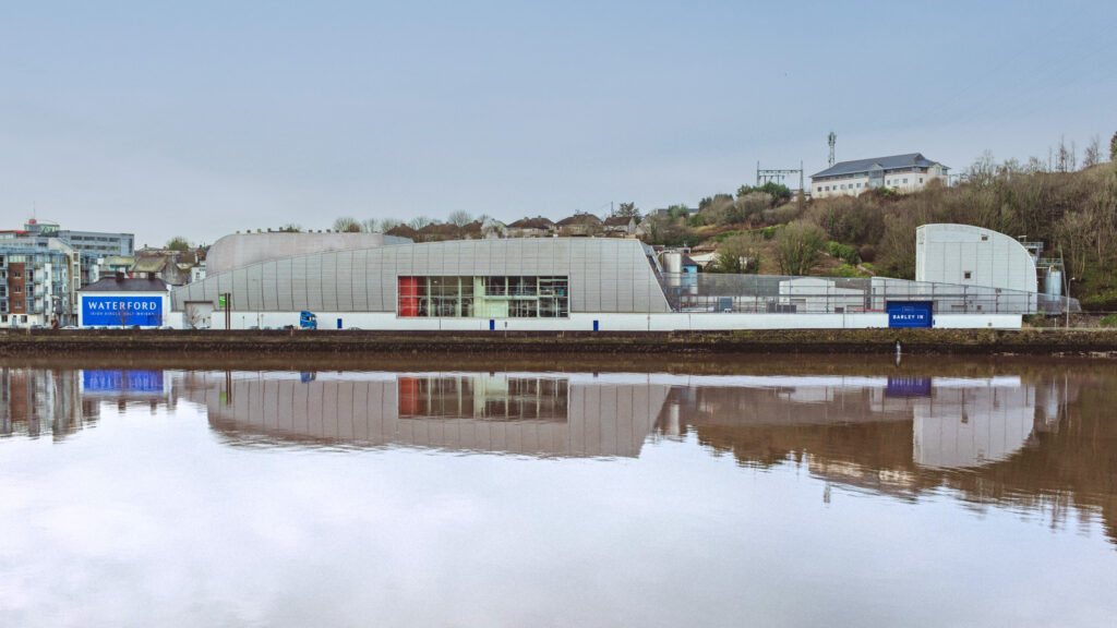 The distillery buildings on Grattan Quay, reflected in the River Suir